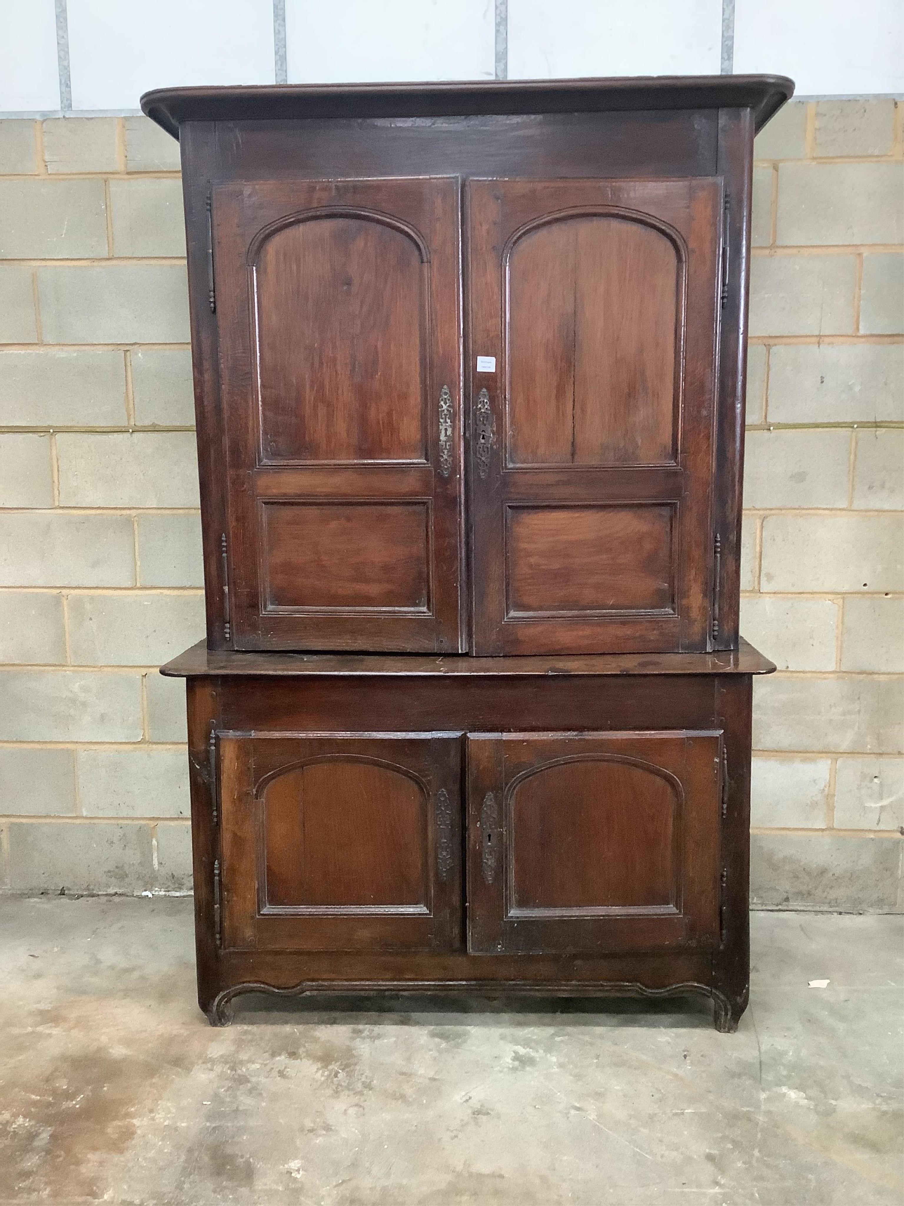 An 18th / 19th century Normandy oak cabinet, width 140cm, depth 68cm, height 215cm. Condition - poor to fair